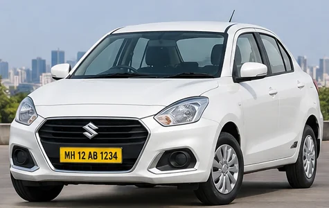 White Swift Dzire local taxi in Mumbai with yellow MH number plate
